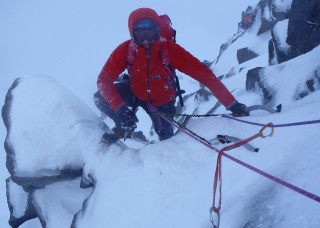 Marc arrives at the next belay