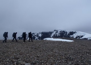 Walking off to the glissade finish