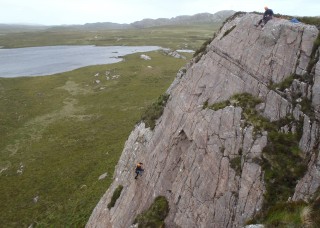 Kyle, the last of the team to climb up
