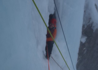 Mark belaying in the cave